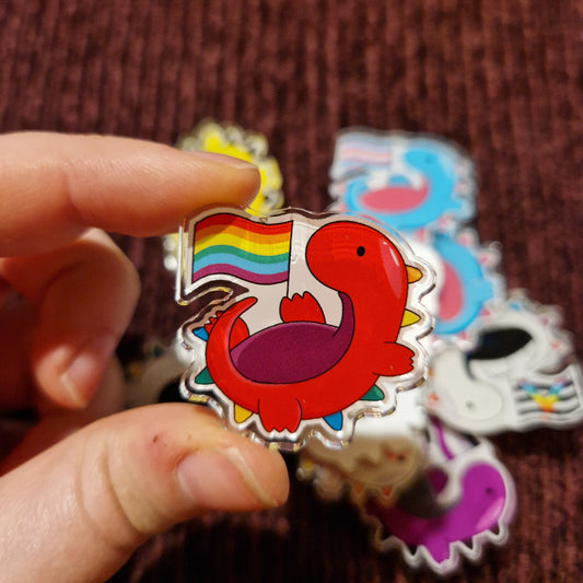 Damaged LGBTQ+ Dino Pins