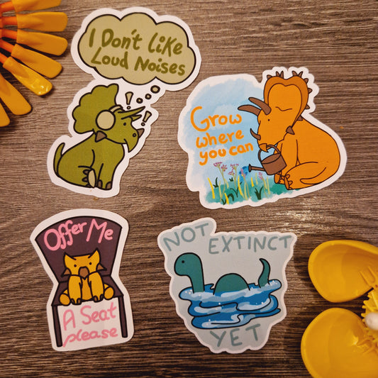 Dinosaur-Themed Mental Health Stickers - 'Offer Me a Seat Please,' 'I Don't Like Loud Noises,' 'Not Extinct Yet,' 'Grow Where You Can'