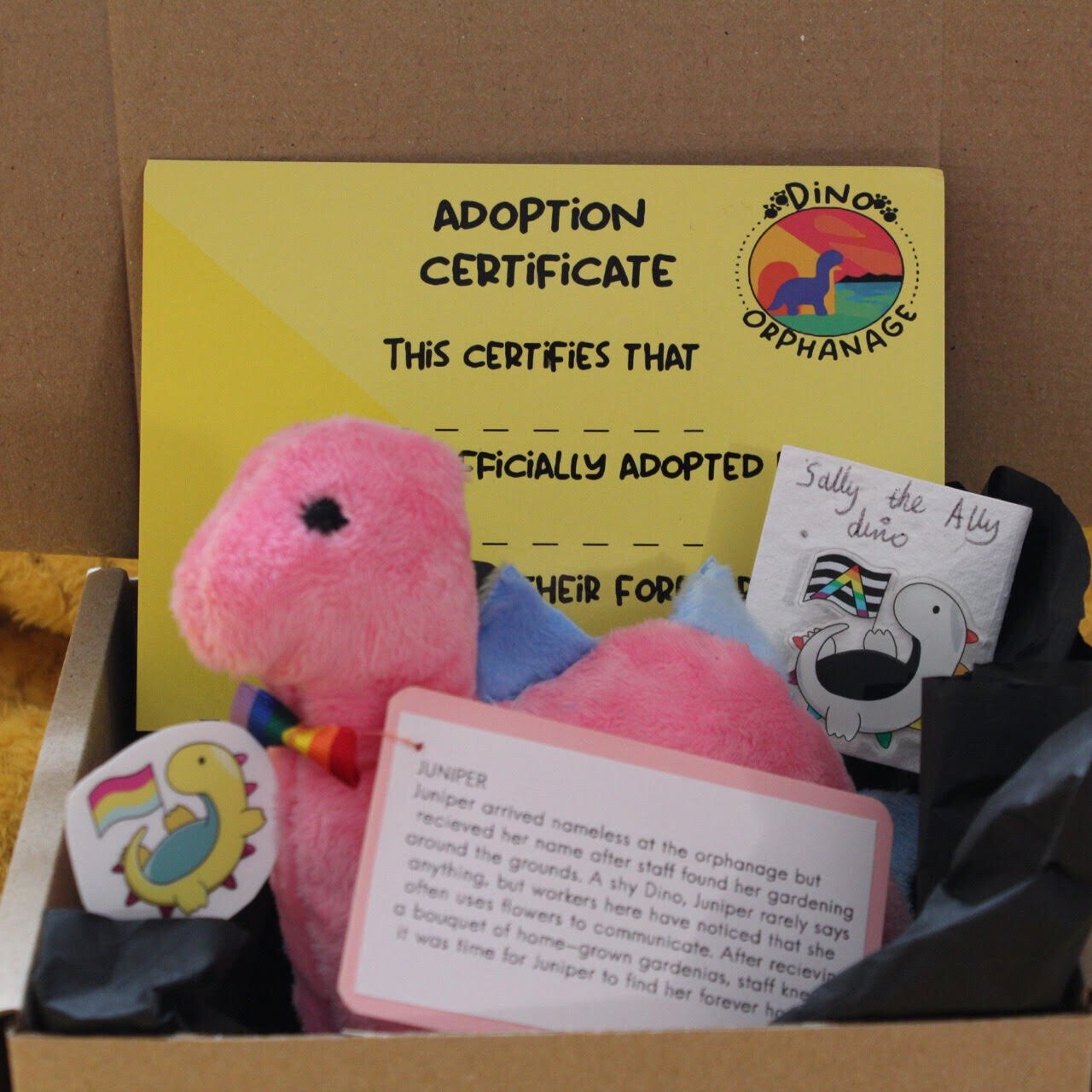 LGBTQ+ Dinosaur Plushie Bundle - Customisable gift bundle including Plushie, Adoption Certificate, Matching Pin and Sticker